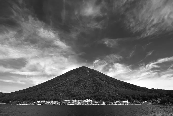 Framed Print : Old volcano mountain over the lake waters