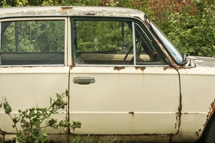 Framed Print : Old weathered abandoned neglected rusty broken vintage obsolete car closeup in rural place