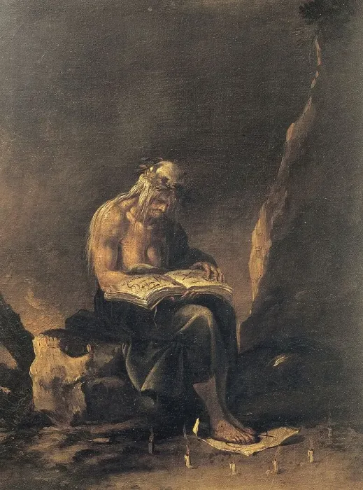 Framed Print : An old witch sits on a rock and reads in a magic book Framed Print : An old witch sits on a rock and reads in a magic book