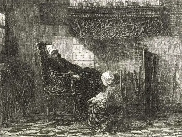Framed Print : Old woman in an armchair in front of a fireplace Framed Print : Old woman in an armchair in front of a fireplace