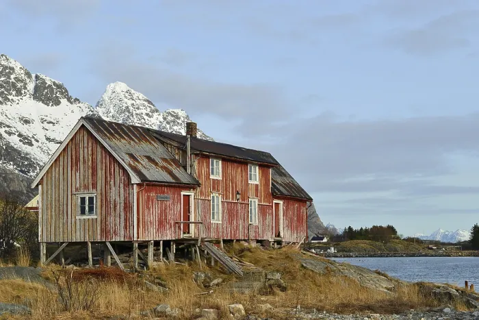 Framed Print : Old wooden house on the seashore