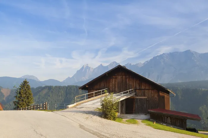 Framed Print : Old woodshed in the high mountains in Austria
