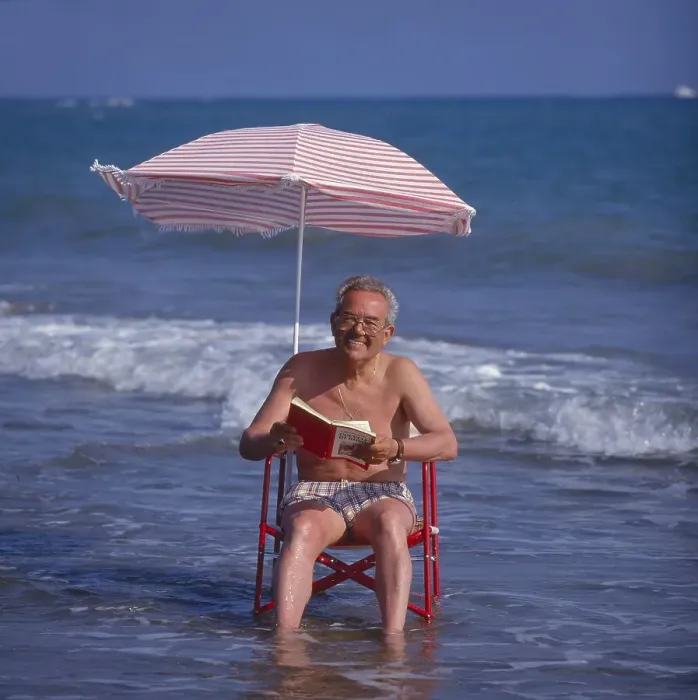Framed Print : Older man in the solar chair and sunshade in the sea Framed Print : Older man in the solar chair and sunshade in the sea