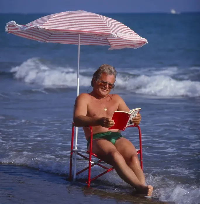 Framed Print : Older man in the solar chair and sunshade in the sea Framed Print : Older man in the solar chair and sunshade in the sea