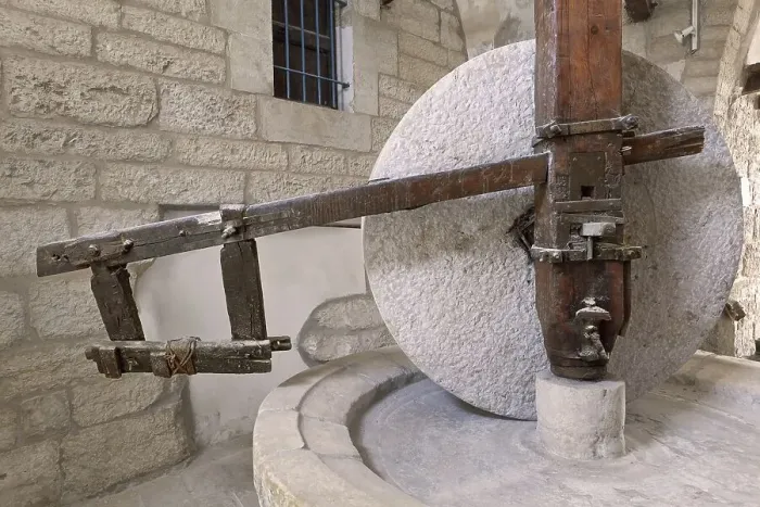 Framed Print : Olive oil stone grinding mill wheel