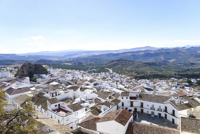 Framed Print : Olvera town displaying traditional white houses under a clear sky in olvera