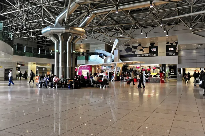 Framed Print : Open airport space with people and architectural details Framed Print : Open airport space with people and architectural details