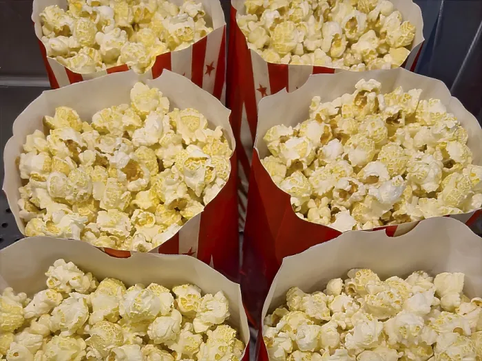 Framed Print : Several open large paper bags with snack popcorn puffed corn popping corn