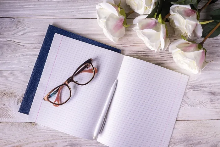Framed Print : Open notebook, glasses, roses Framed Print : Open notebook, glasses, roses