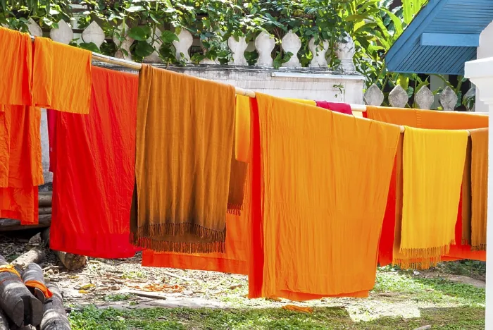 Framed Print : Orange clad robes aka. buddhist monks clothes drying outside