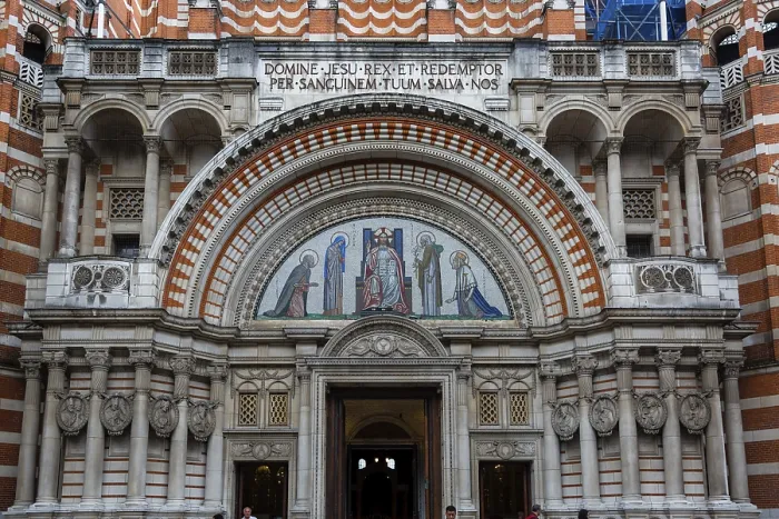 Framed Print : The ornate entrance of a historic cathedral with red brick and decorative elements in Greater London