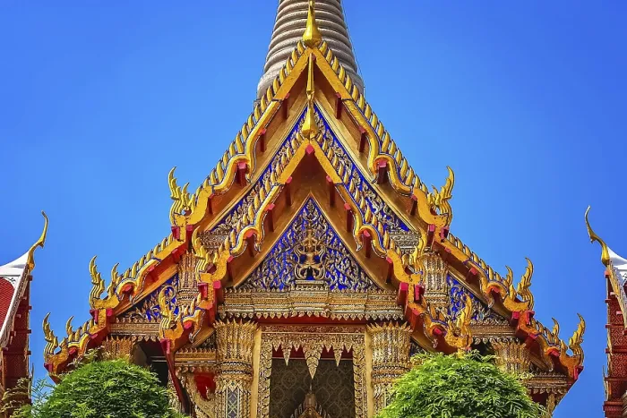 Framed Print : Ornate golden triangular roof of a Buddhist temple in Bangkok