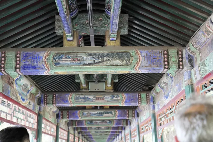 Framed Print : Ornate, painted ceiling beams in traditional architecture with rich detail