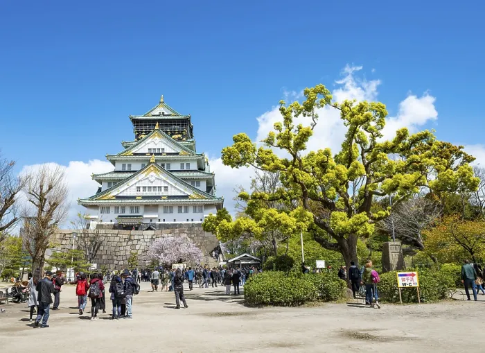 Framed Print : Osaka castle among trees in the park