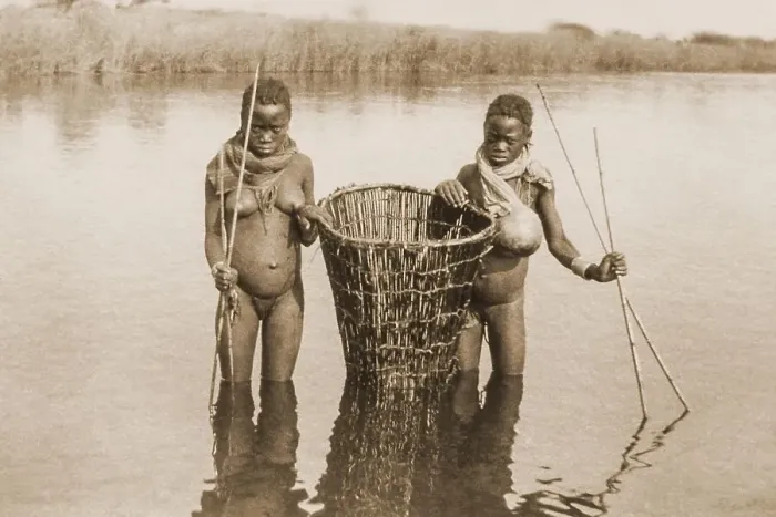 Framed Print : Two Ovambo girls in a river while fishing Framed Print : Two Ovambo girls in a river while fishing
