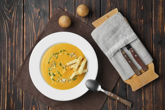 Framed Print : Overhead view of aubergine soup puree with pumpkin seed and crouton