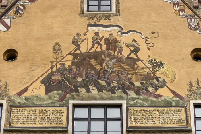 Framed Print : Painted facade with a boat and people on the Danube at Ulm Town Hall from the 15th century