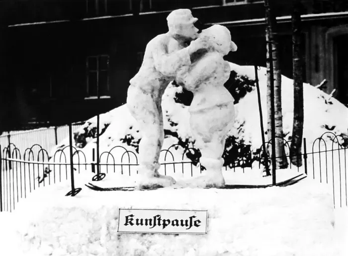 Framed Print : Pair of snow, snowman and snow woman kissing