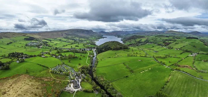 Framed Print : Panorama of Farms and mountains over Ullswater Lake from drone