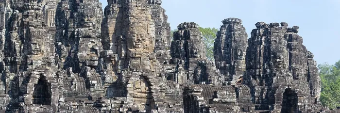 Framed Print : Panoramic picture of huge stone-carved faces of Bodhisattva Lokeshvara