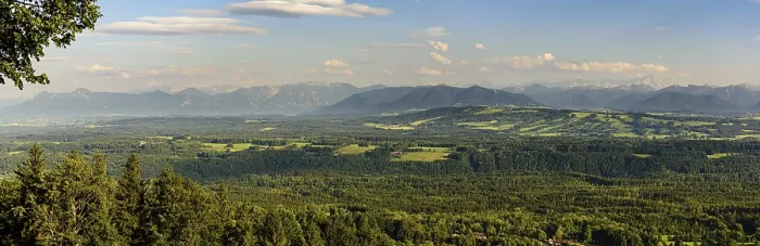 Framed Print : Panoramic view of an idyllic landscape with mountains in the background and extensive forests in the foreground Framed Print : Panoramic view of an idyllic landscape with mountains in the background and extensive forests in the foreground