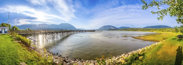 Framed Print : Panoramic view of a long wooden pier stretching into the tranquil waters of shuswap lake