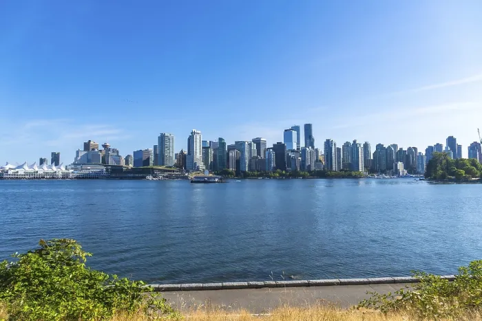 Framed Print : Panoramic view of vancouver's modern skyline rising above the calm pacific ocean on a sunny day Framed Print : Panoramic view of vancouver's modern skyline rising above the calm pacific ocean on a sunny day