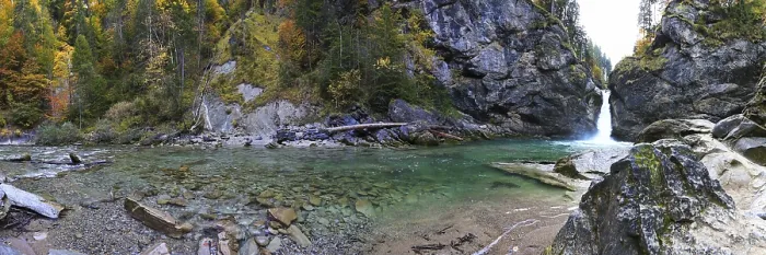 Framed Print : Panoramic view of a waterfall with clear water and autumn trees