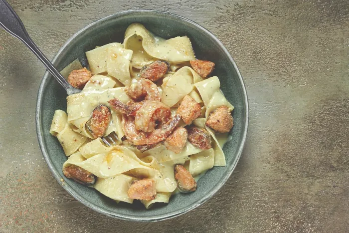 Framed Print : Papardelle pasta in creamy sauce with seafood