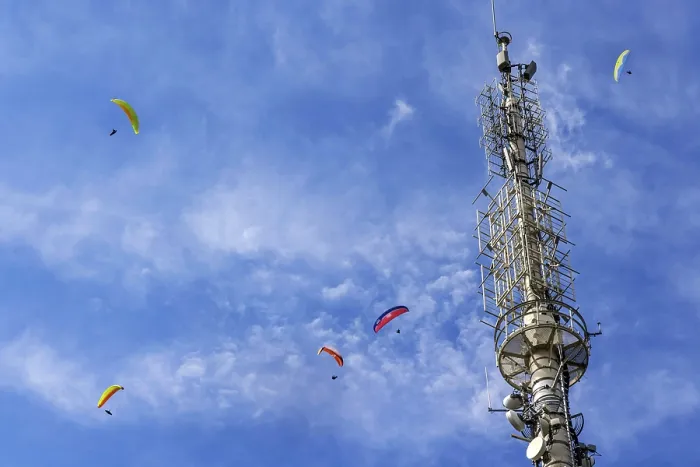 Framed Print : Paragliders flying over Mount Mercury with transmitter mast in Baden-Baden