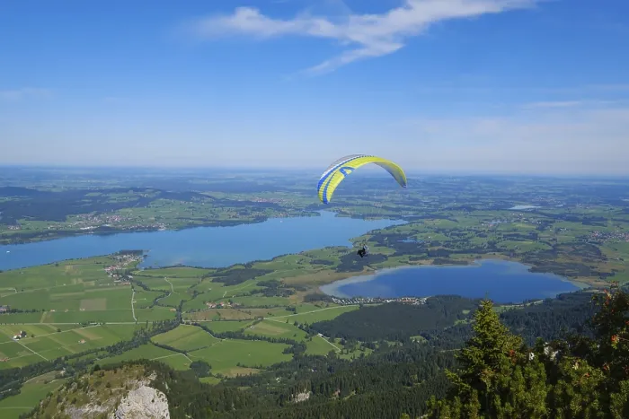 Framed Print : Paragliding over Bannwaldsee and Forggensee
