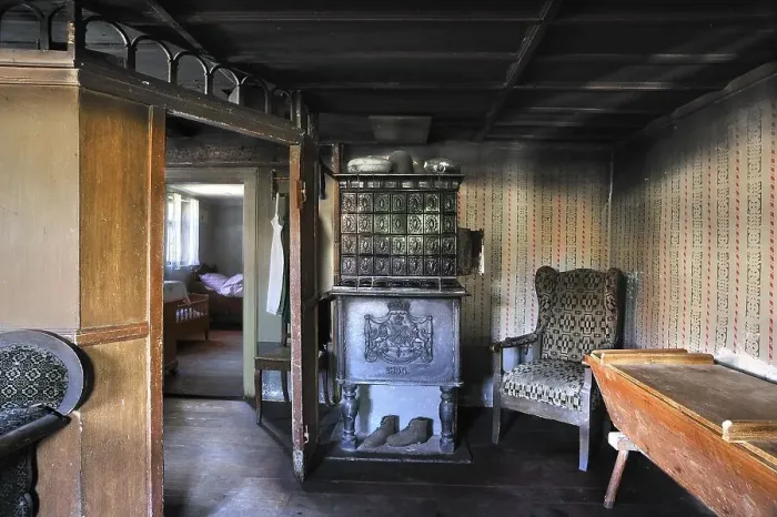 Framed Print : Parlour around 1900 with tiled stove in farmhouse built in 1772 Framed Print : Parlour around 1900 with tiled stove in farmhouse built in 1772