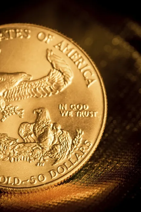 Framed Print : Partial view of an American gold coin highlighting the eagle and engravings