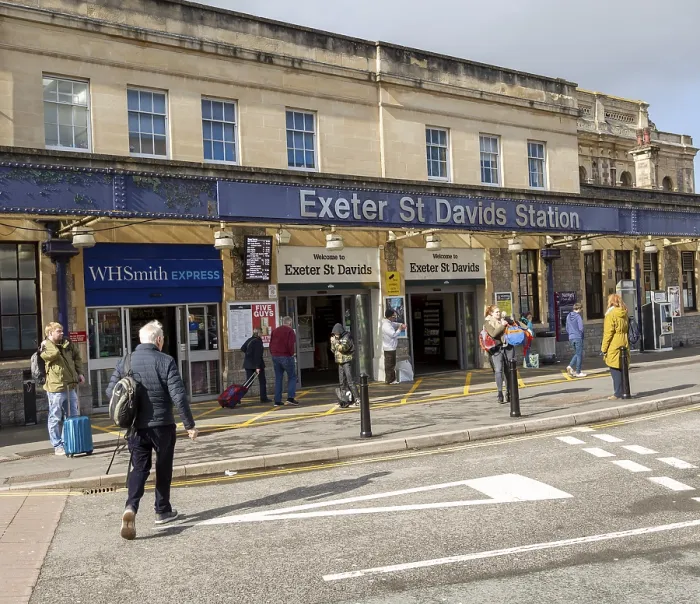 Framed Print : Passengers outside Exeter St David's railway station