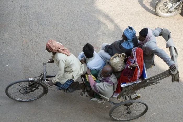 Framed Print : Passengers sitting in cycle rickshaw