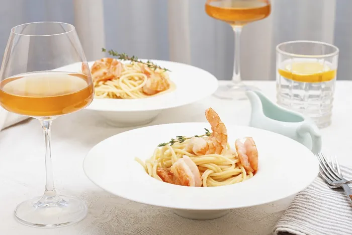 Framed Print : Pasta with shrimp and thyme, served on a white plate