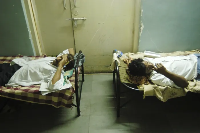 Framed Print : Patients being treated in the municipal hospital due to over crowding