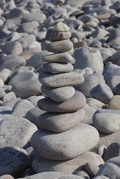 Framed Print : Pebble sculpture on a beach Framed Print : Pebble sculpture on a beach