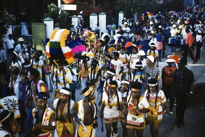 Framed Print : People in colourful costumes at the carnival parade in Port of Spain, Trinidad 1963 with the inscription Red Indians Framed Print : People in colourful costumes at the carnival parade in Port of Spain, Trinidad 1963 with the inscription Red Indians