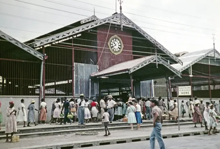 Framed Print : People crowd outside market building Castries, St Lucia, West Indies 1962 Framed Print : People crowd outside market building Castries, St Lucia, West Indies 1962