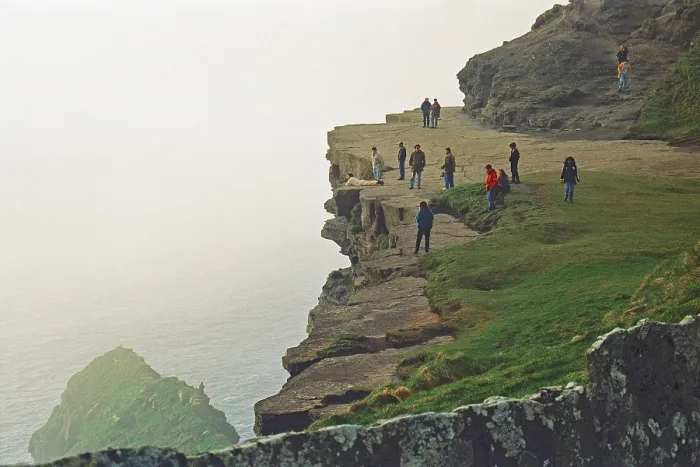 Framed Print : People on the edge of a cliff, there was no fence back then