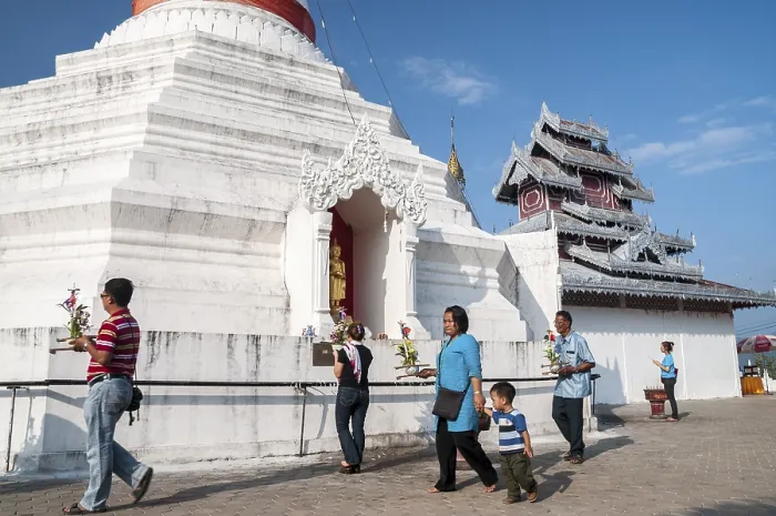 Framed Print : People with offerings walking around a Pagoda or Chedi