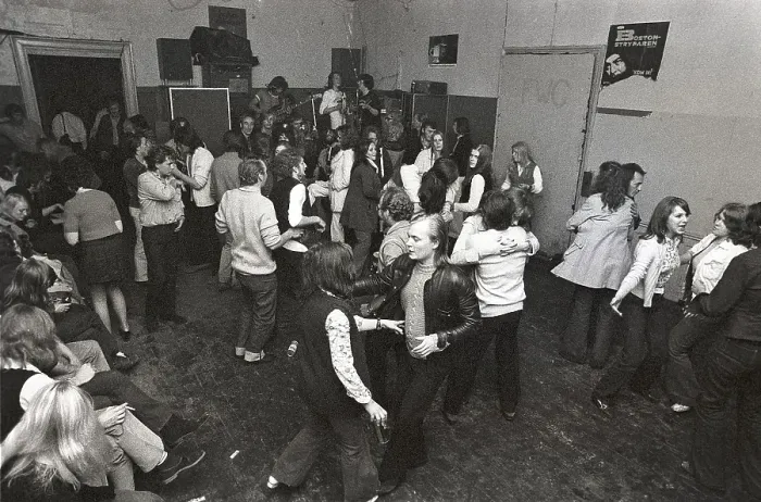 Framed Print : This is how people partied in the 1970s. People dance and drink beer while a band plays live music. Women and men dance to the music, drink beer and smoke in a rather dull party room that everyone somehow seems to enjoy and have fun in. 1970 Framed Print : This is how people partied in the 1970s. People dance and drink beer while a band plays live music. Women and men dance to the music, drink beer and smoke in a rather dull party room that everyone somehow seems to enjoy and have fun in. 1970