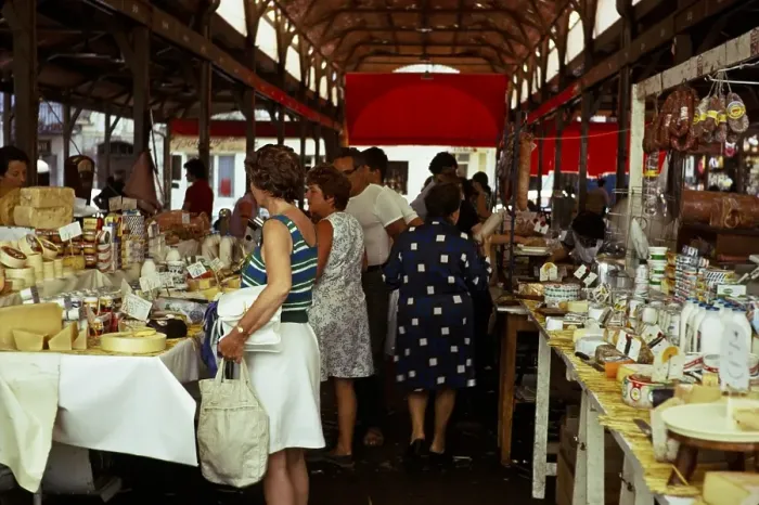 Framed Print : People shopping at a food market in Grasse, Cote d'Azur, France 1974