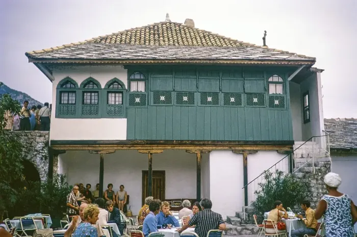 Framed Print : People sitting at cafe tables at Bey or Bey's House, Trebinje, Bosnia and Herzegovina, former Yugoslavia, Europe 1970, Europe