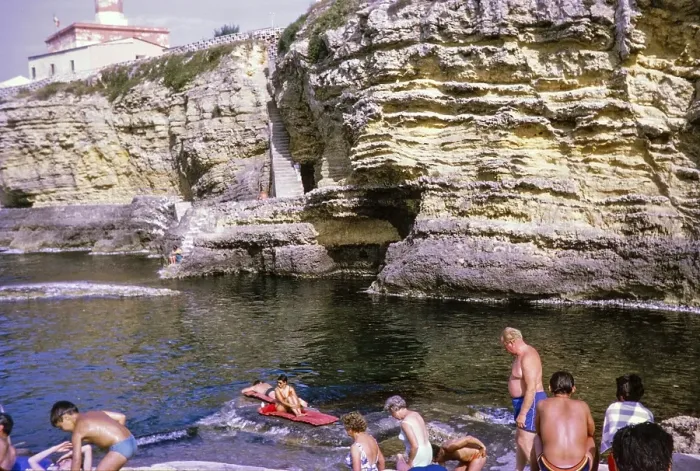 Framed Print : People sunbathing on rocky coastal ledge by Mediterranean Sea, Syracuse, Sicily, Italy, Europe 1969, Europe