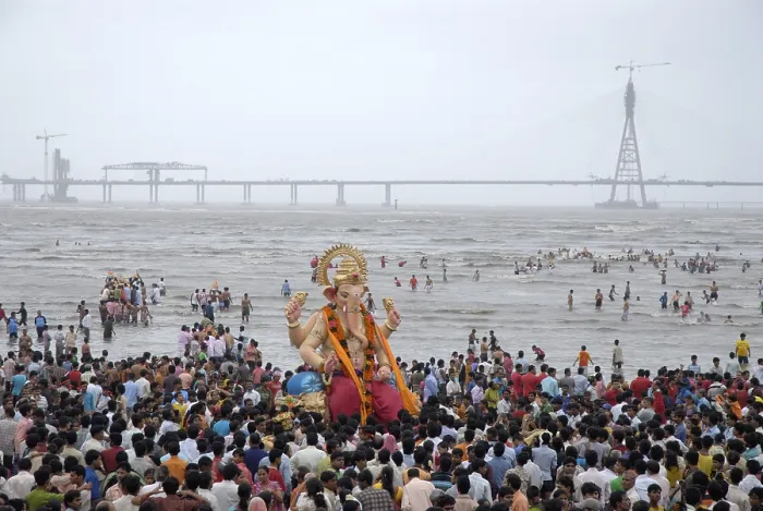 Framed Print : People taking huge lord ganesha idol for immersion at Chowpaty