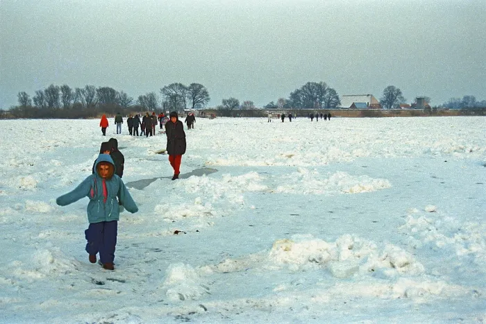Framed Print : People walk across ice rink, frozen Elbe Framed Print : People walk across ice rink, frozen Elbe
