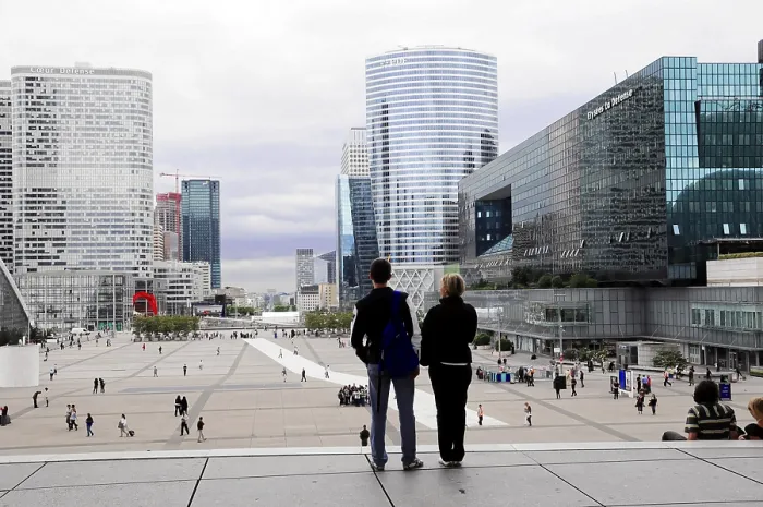 Framed Print : Two people watching the modern skyline in the business district of Paris Framed Print : Two people watching the modern skyline in the business district of Paris
