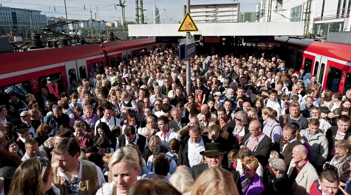Framed Print : Many people on their way to the Wiesn or Oktoberfest grounds